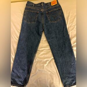 Levi 550 Men’s 38x32 navy blue colored jeans.